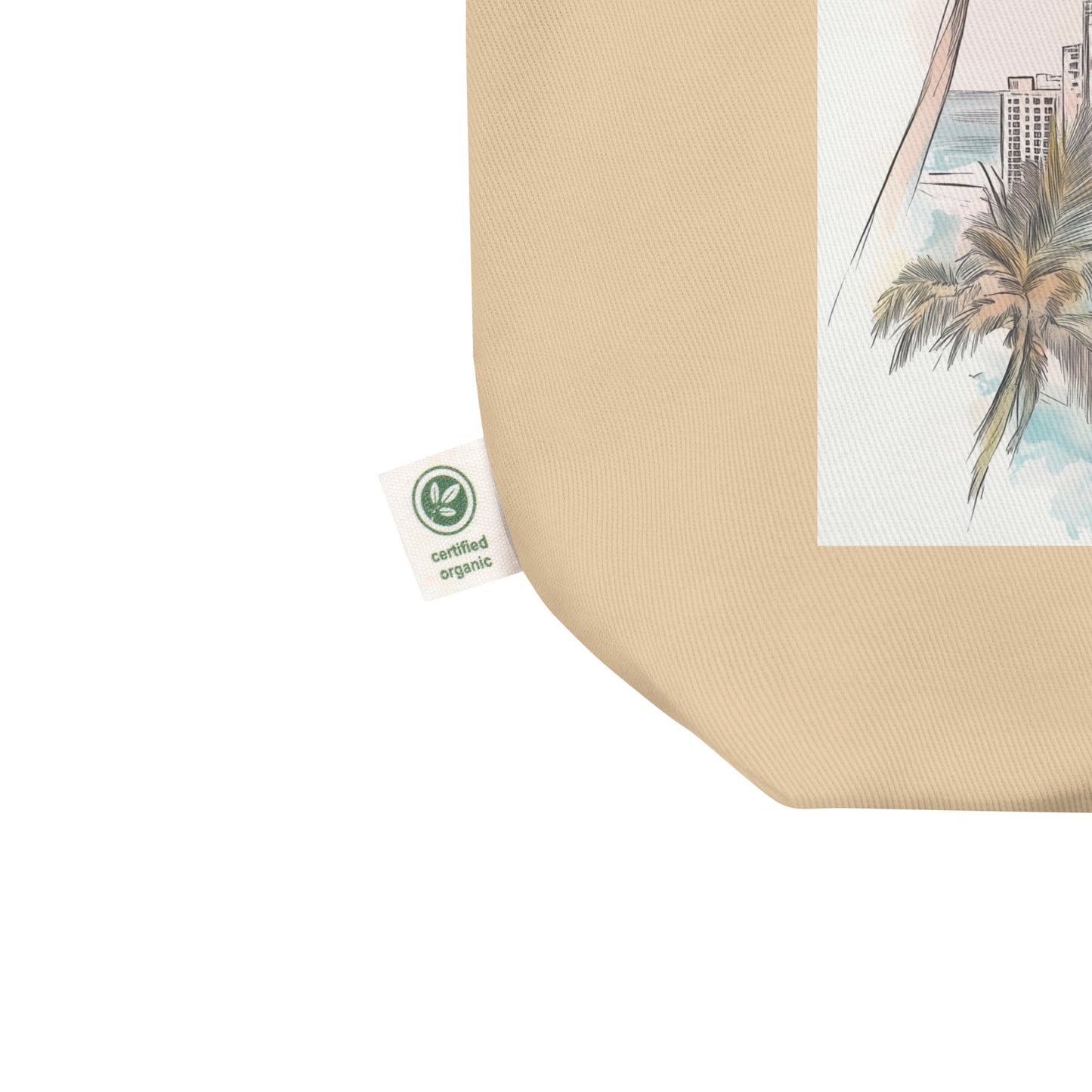 Close-up of the tote bag’s bottom corner, showing the “certified organic” label and part of the colorful Miami print. Emphasizes quality craftsmanship and eco-conscious materials.